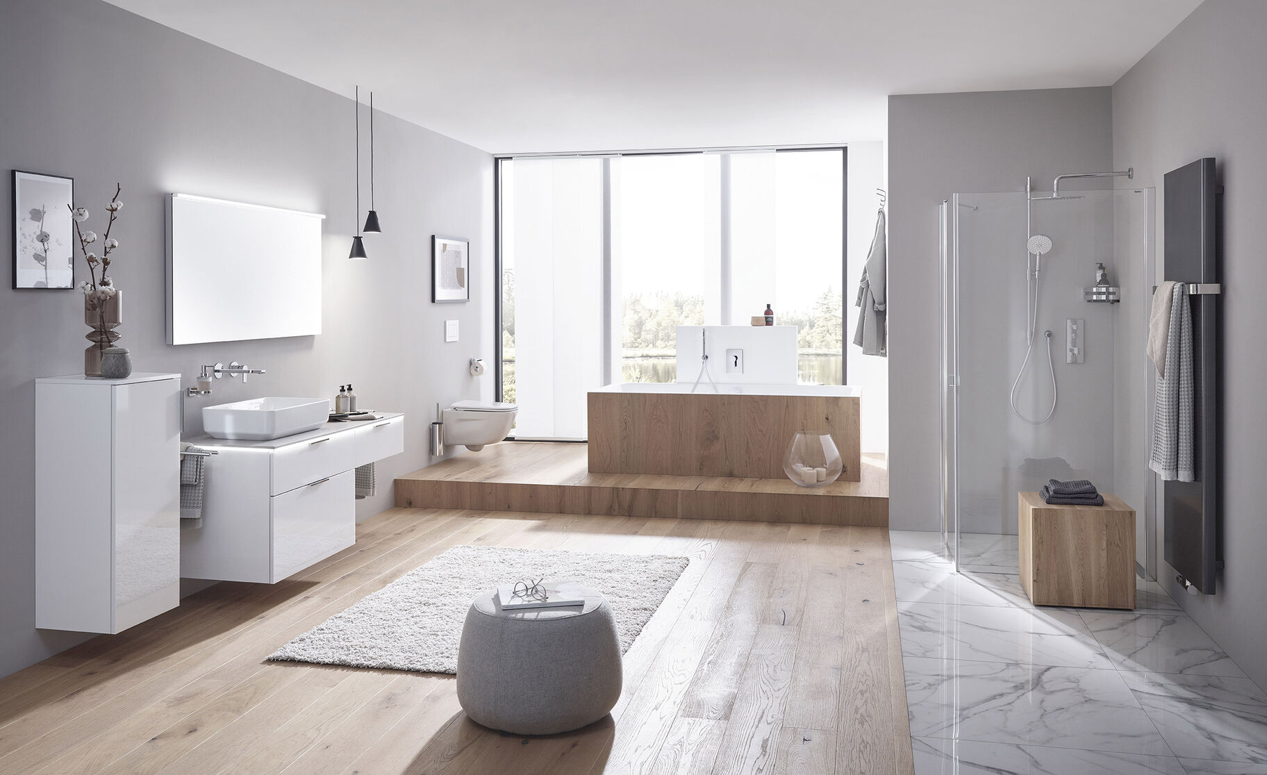 Ein modernes Badezimmer mit minimalistischer Einrichtung: eine freistehende Badewanne, eine Glasdusche und ein stilvolles Waschbecken, alles in hellen Tönen. Ein modernes Badezimmer mit minimalistischer Einrichtung: eine freistehende Badewanne, eine Glasdusche und ein stilvolles Waschbecken, alles in hellen Tönen.
