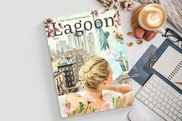 Ein Magazin mit dem Titel "Lagoon" liegt auf einem Tisch. Daneben sind eine Tastatur, eine Tasse Kaffee, Büroklammern und ein Notizblock zu sehen. Ein Magazin mit dem Titel "Lagoon" liegt auf einem Tisch. Daneben sind eine Tastatur, eine Tasse Kaffee, Büroklammern und ein Notizblock zu sehen.